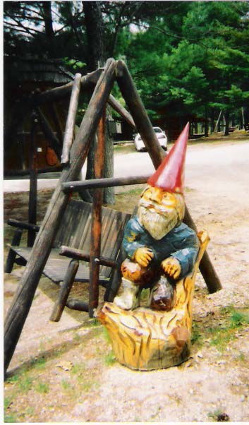 Gnome Sitting by Swing